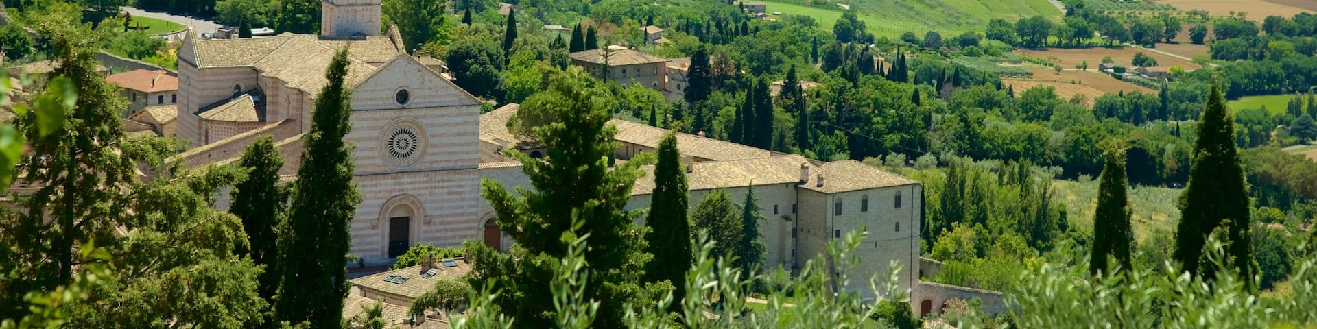 Basilica of Santa Chiara which includes landscape views, farmland and a church or cathedral