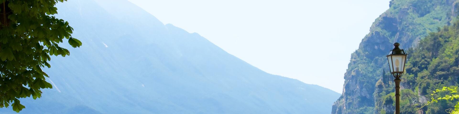 Trentino which includes general coastal views and mountains as well as a small group of people