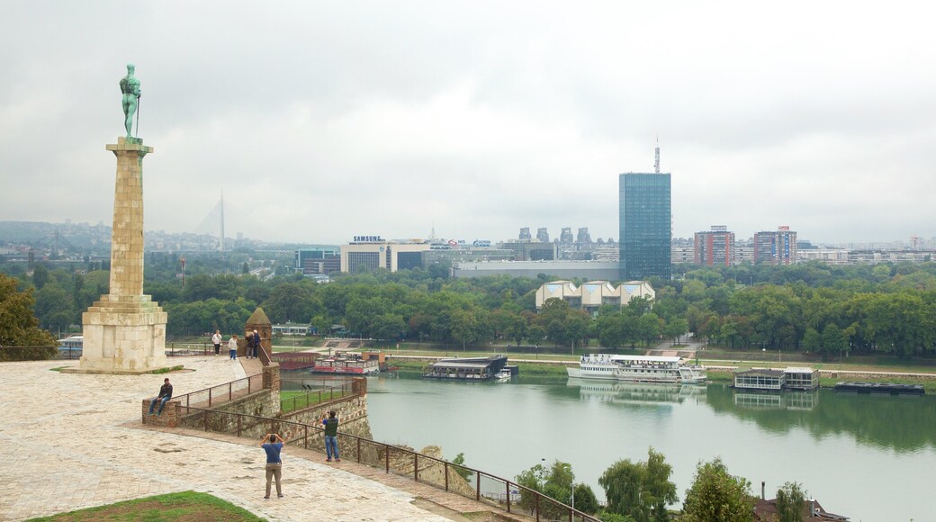 Pobednik which includes boating, views and a skyscraper