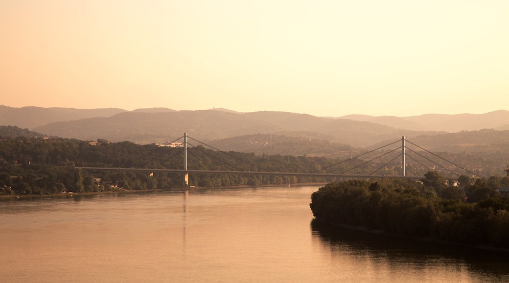 Novi Sad showing a river or creek, a suspension bridge or treetop walkway and a sunset