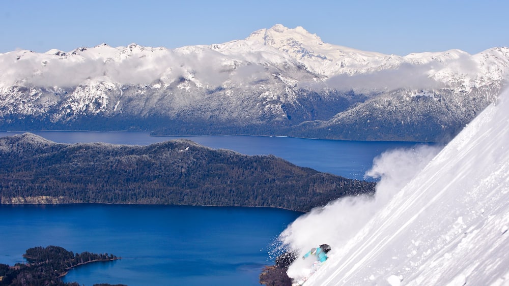 Cerro Bayo which includes mountains, a lake or waterhole and snow
