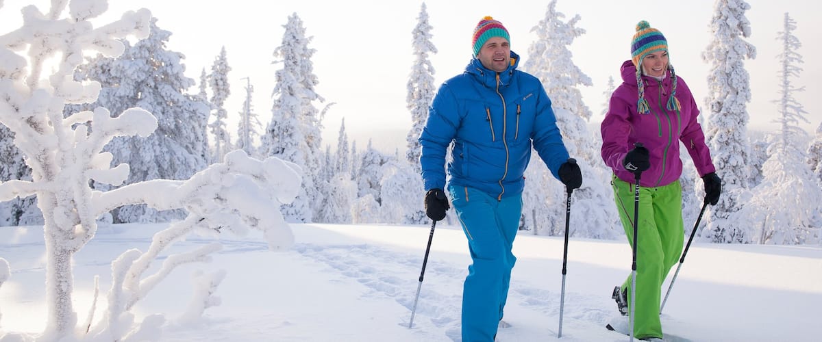 Yllas Ski Resort showing snow shoeing and snow as well as a couple