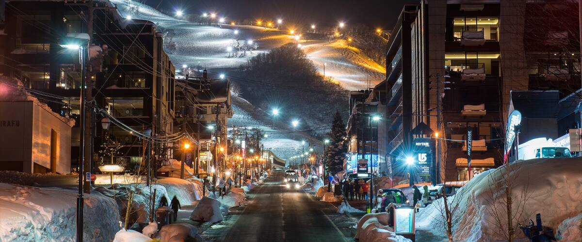 Niseko which includes a city, snow and street scenes