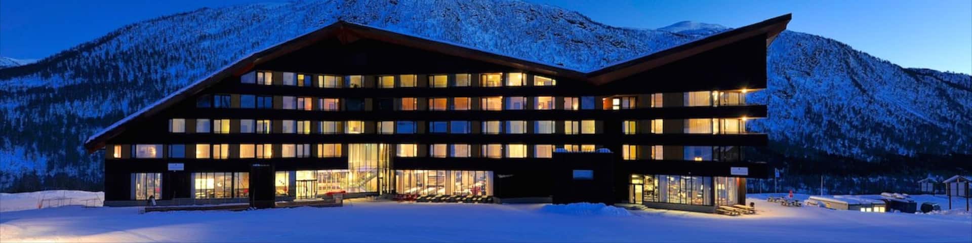 Myrkdalen showing snow, night scenes and a luxury hotel or resort