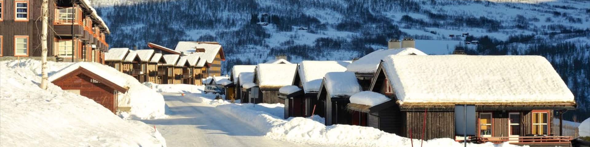 Myrkdalen which includes a small town or village, mountains and snow