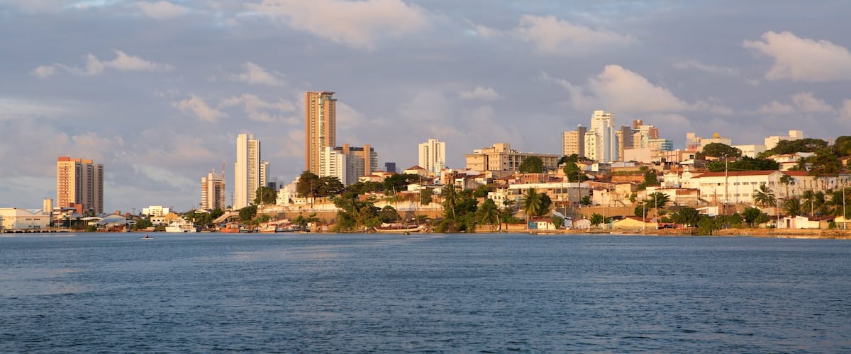 Natal which includes general coastal views, a skyscraper and a coastal town