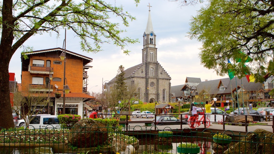Nicoletti Square featuring a pond, a church or cathedral and a city