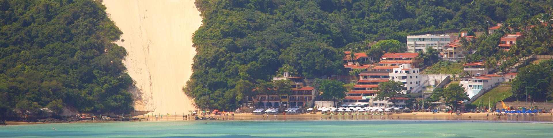 Ponta Negra Beach featuring a coastal town and general coastal views