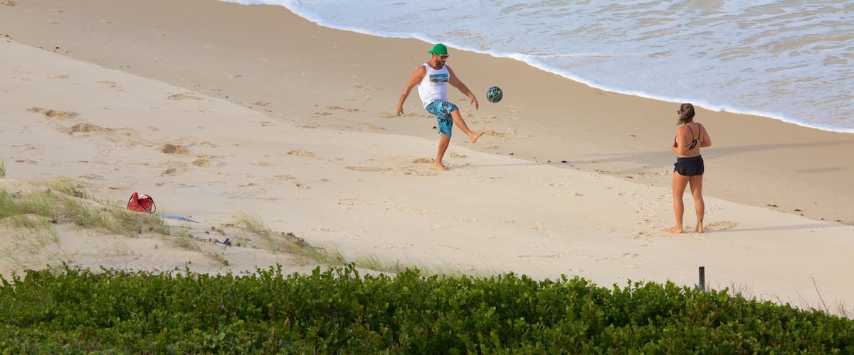 Pipa featuring a sandy beach and general coastal views as well as a couple