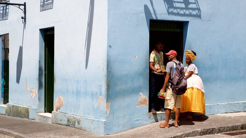 Pelourinho featuring street scenes and a house as well as a small group of people