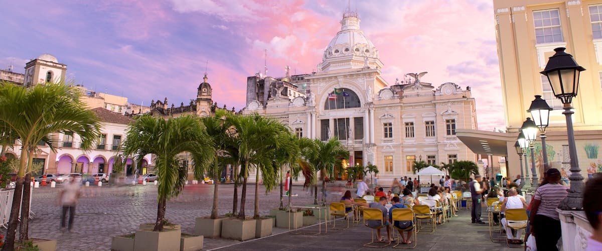 Salvador featuring an administrative buidling, a sunset and outdoor eating