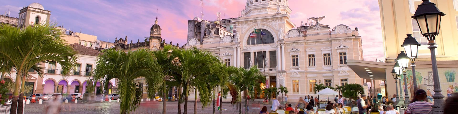 Salvador featuring an administrative buidling, a sunset and outdoor eating