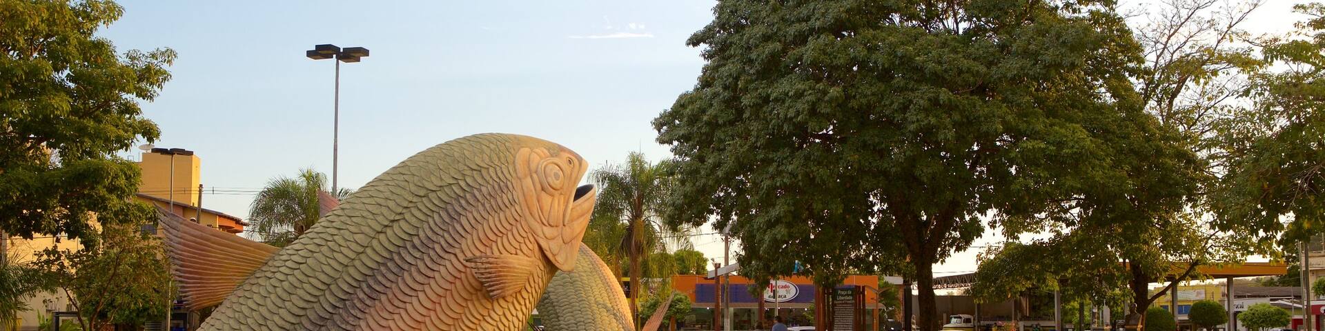 Public Square which includes a statue or sculpture and a garden