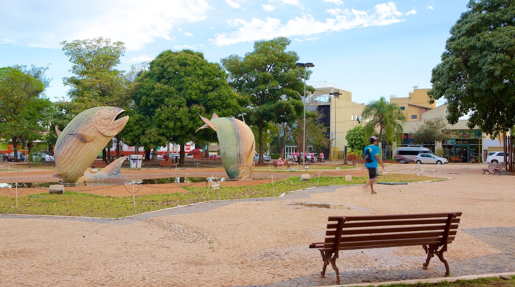 Public Square showing a statue or sculpture and a garden