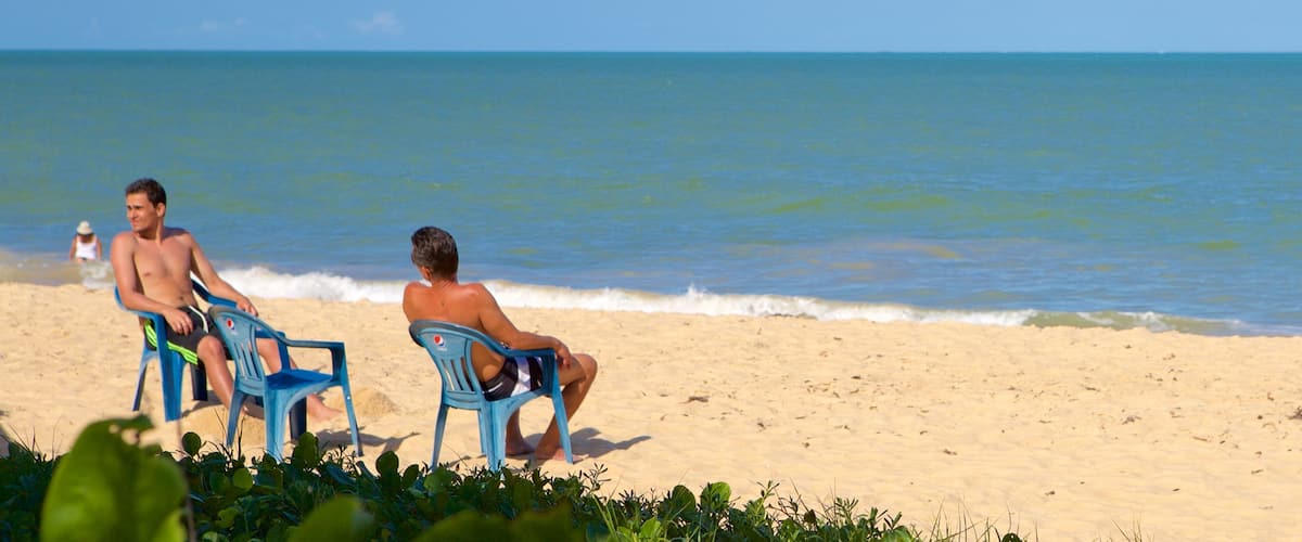 Taperapuan Beach featuring surf, general coastal views and a beach