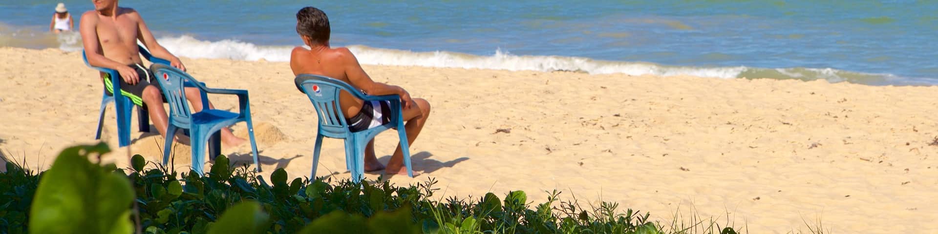 Taperapuan Beach which includes surf, general coastal views and a sandy beach