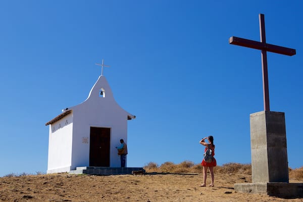 Sao Pedro Chapel showing a church or cathedral and religious elements as well as a couple