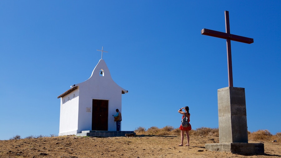 Sao Pedro Chapel showing a church or cathedral and religious aspects as well as a couple
