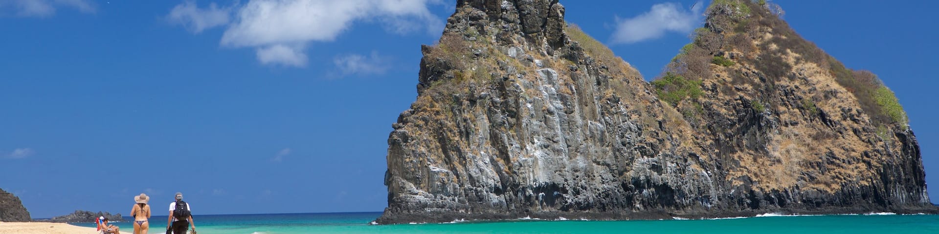 Cacimba do Padre Beach showing a sandy beach, general coastal views and island views