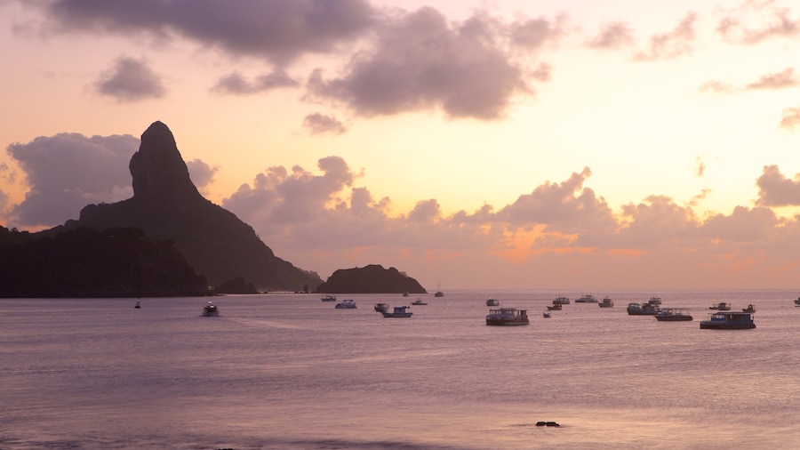 Santo Antonio Port which includes general coastal views, a pebble beach and mountains