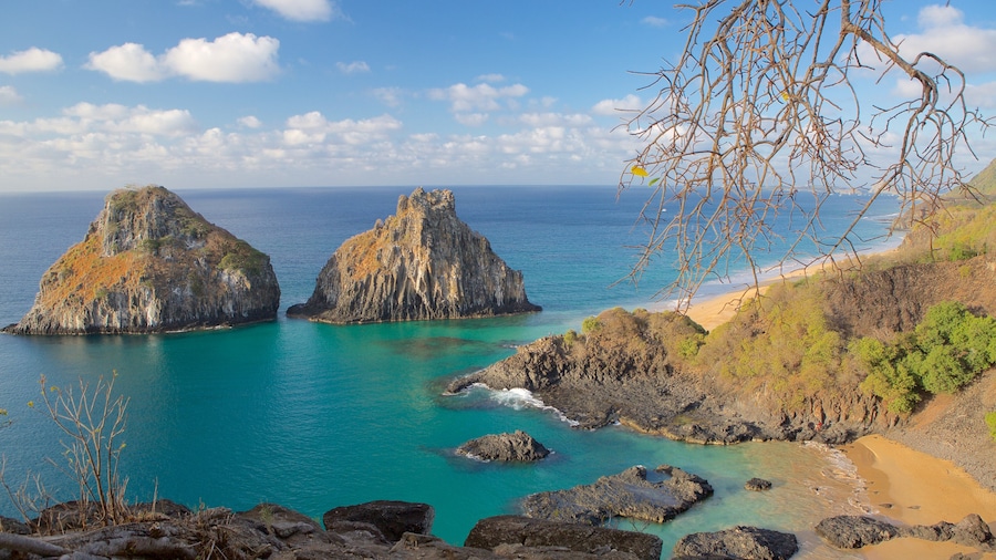 Porcos Bay featuring general coastal views, island views and rugged coastline