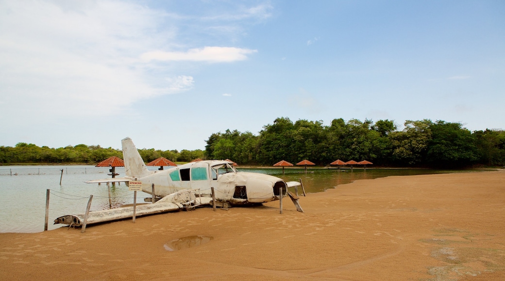 Figueira Beach featuring general coastal views, aircraft and a beach