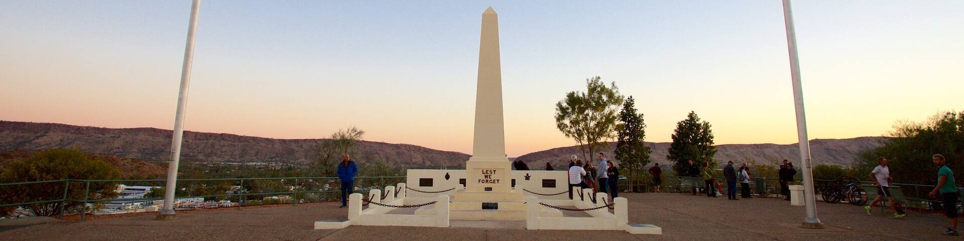 Alice Springs showing a sunset, views and military items