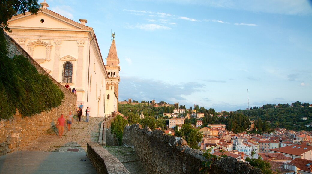 Piran which includes a coastal town