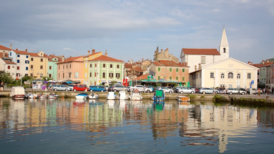 Izola Marina featuring a small town or village and a bay or harbor