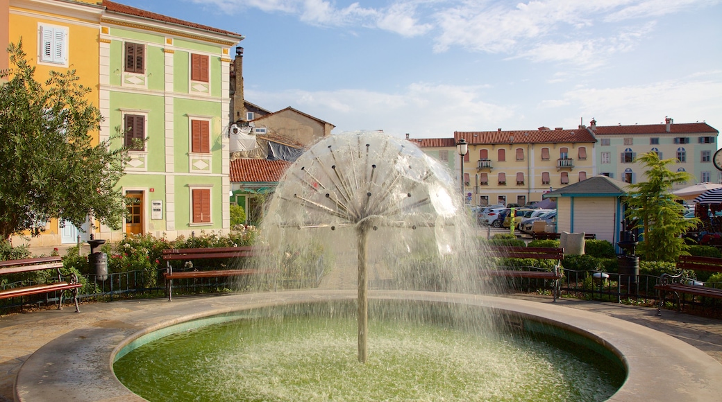 Izola showing a fountain, a pond and a square or plaza