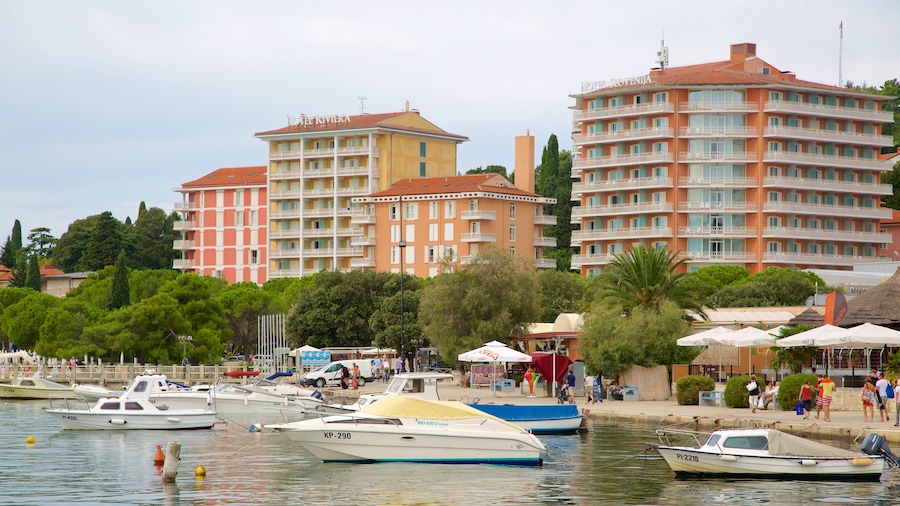 Portoroz Beach which includes a marina, a coastal town and boating