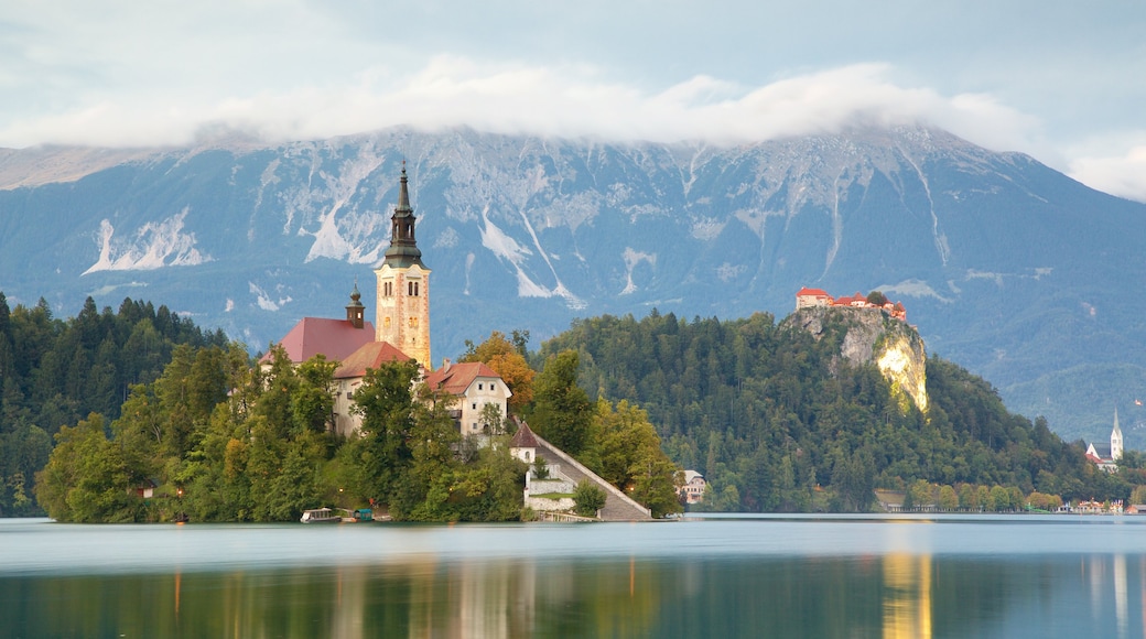 Lake Bled featuring a lake or waterhole, landscape views and mountains