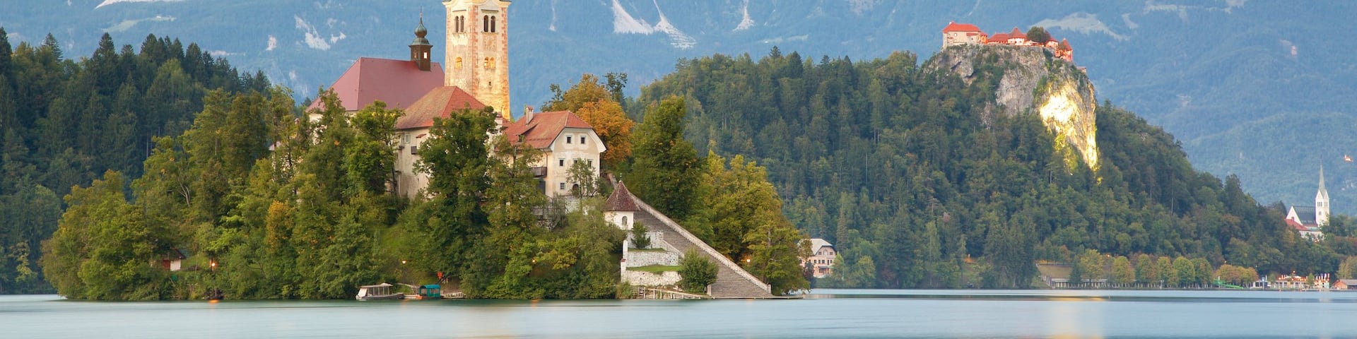 Lake Bled showing landscape views, a lake or waterhole and mountains