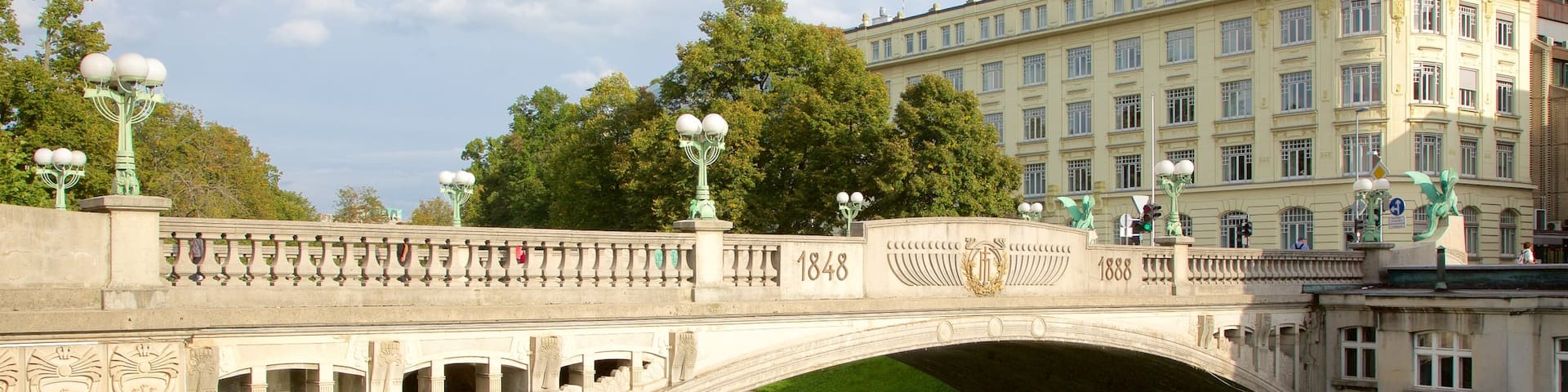 Dragon Bridge which includes heritage architecture, a bridge and a river or creek
