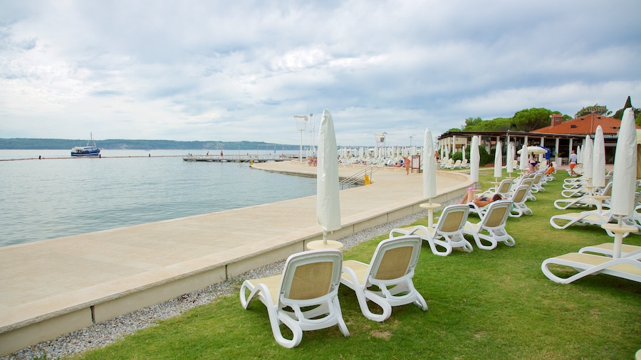 Portoroz Beach which includes a coastal town, boating and general coastal views