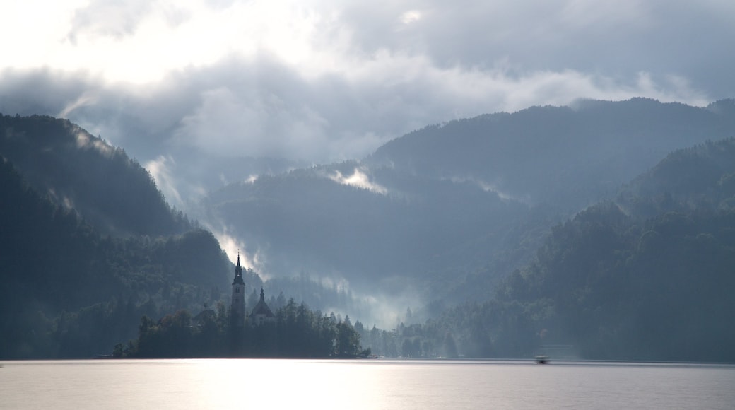 Church of Sv Marika Bozja showing a lake or waterhole, a church or cathedral and mountains