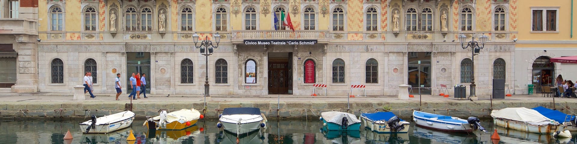 Trieste showing a river or creek, boating and heritage architecture
