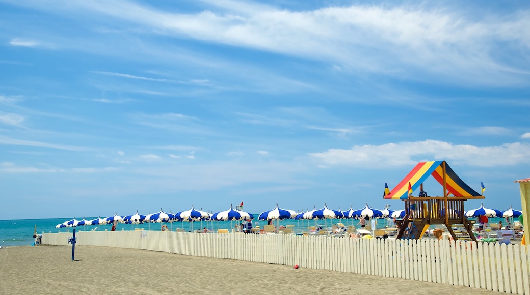 Tarquinia which includes a sandy beach