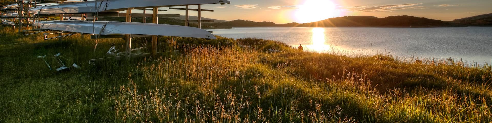 Falls Creek featuring a sunset and a river or creek
