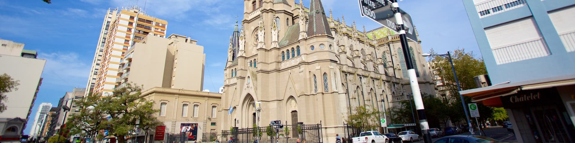 Mar del Plata Cathedral showing a city, a church or cathedral and signage
