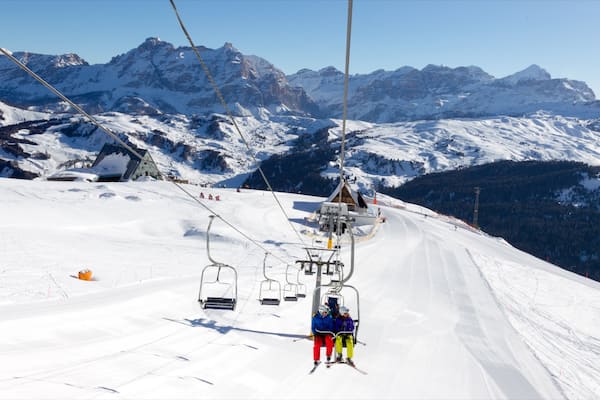 Corvara in Badia featuring mountains, a gondola and snow