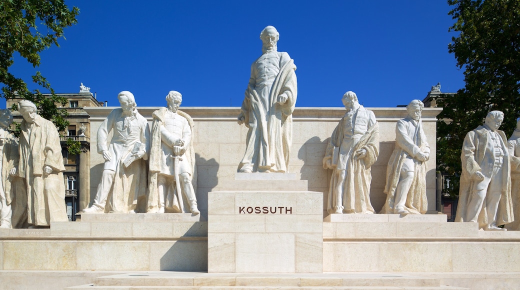 Ungerns parlamentsbyggnad som visar skyltar, en staty eller skulptur och ett monument