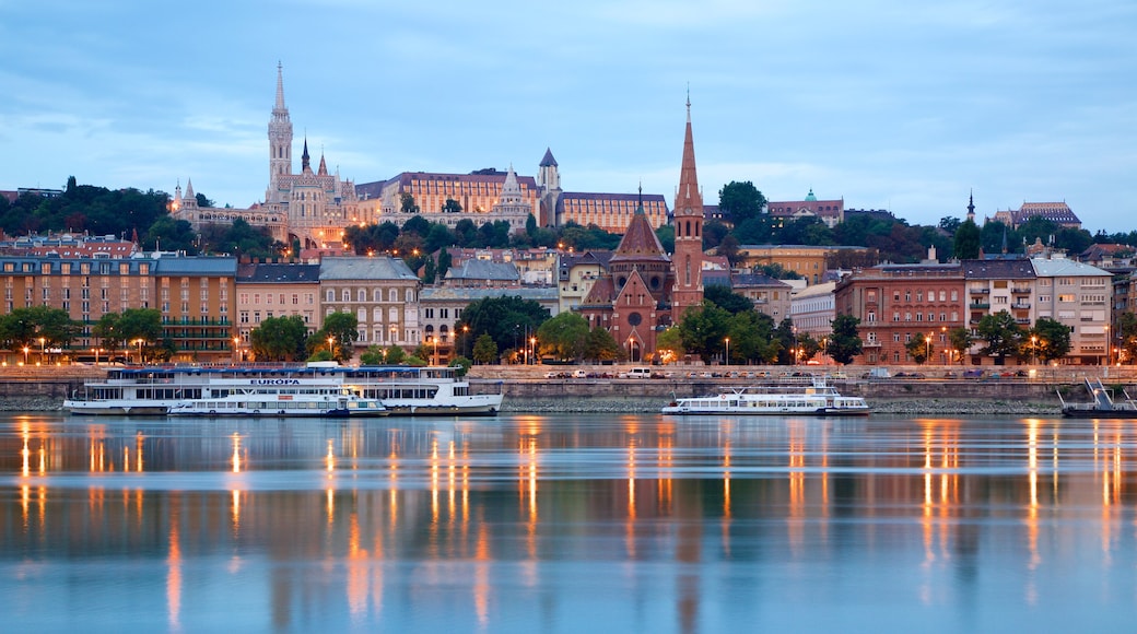 Matthias Church featuring a river or creek, a ferry and heritage architecture