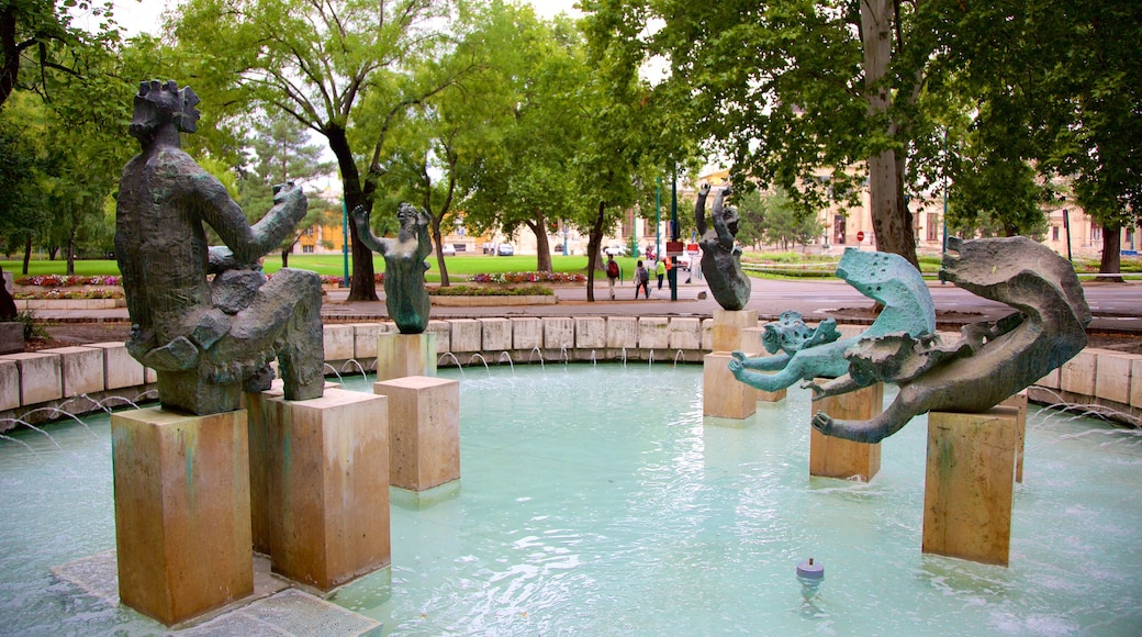 Varosliget mettant en vedette jardin, fontaine et statue ou sculpture