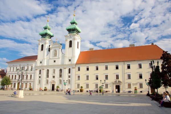 Gyor Benedictine Church featuring heritage architecture, a church or cathedral and a square or plaza