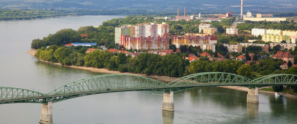 Esztergom showing industrial elements, a river or creek and a bridge