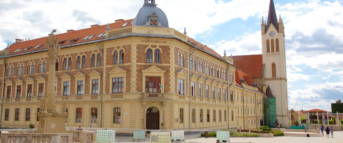 Keszthely which includes a square or plaza, an administrative buidling and a monument