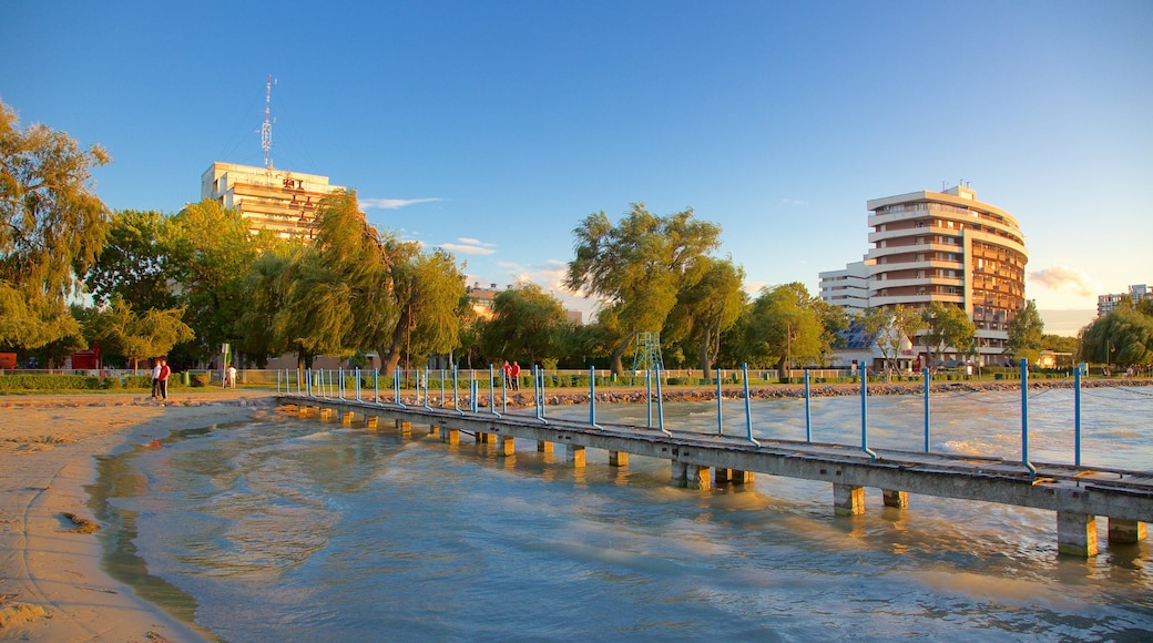 Golden Shore which includes a beach and views