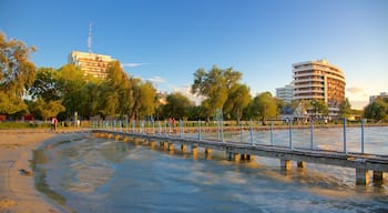 Golden Shore which includes a beach and views