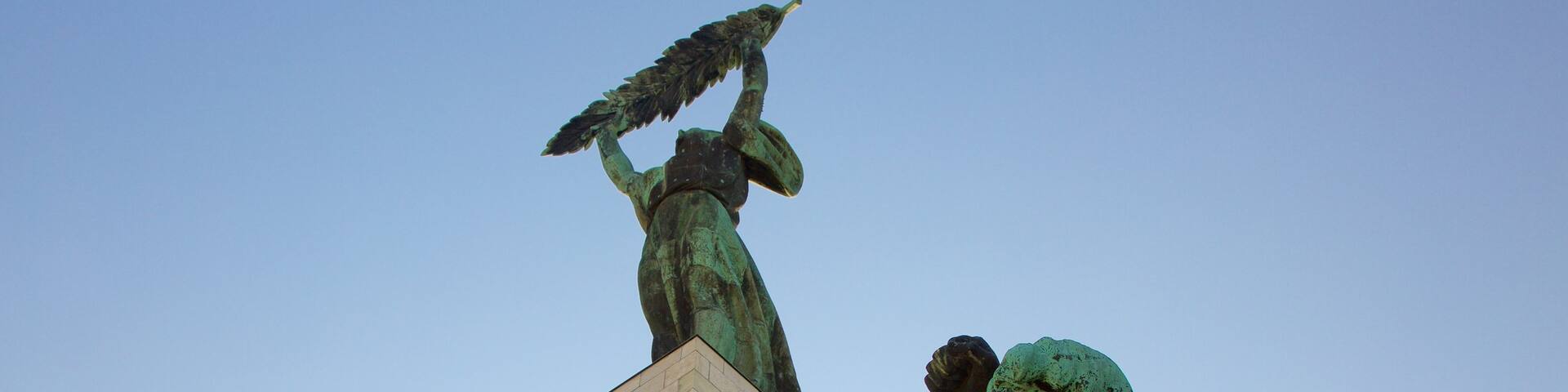 Liberty Statue featuring a monument and a statue or sculpture